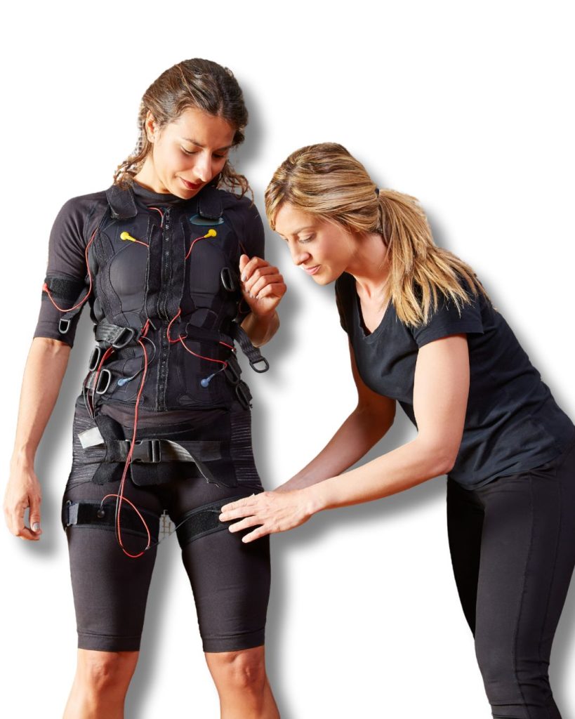 EMS training Abu Dhabi at home with a certified HomeFit Elite personal trainer guiding a full-body session.